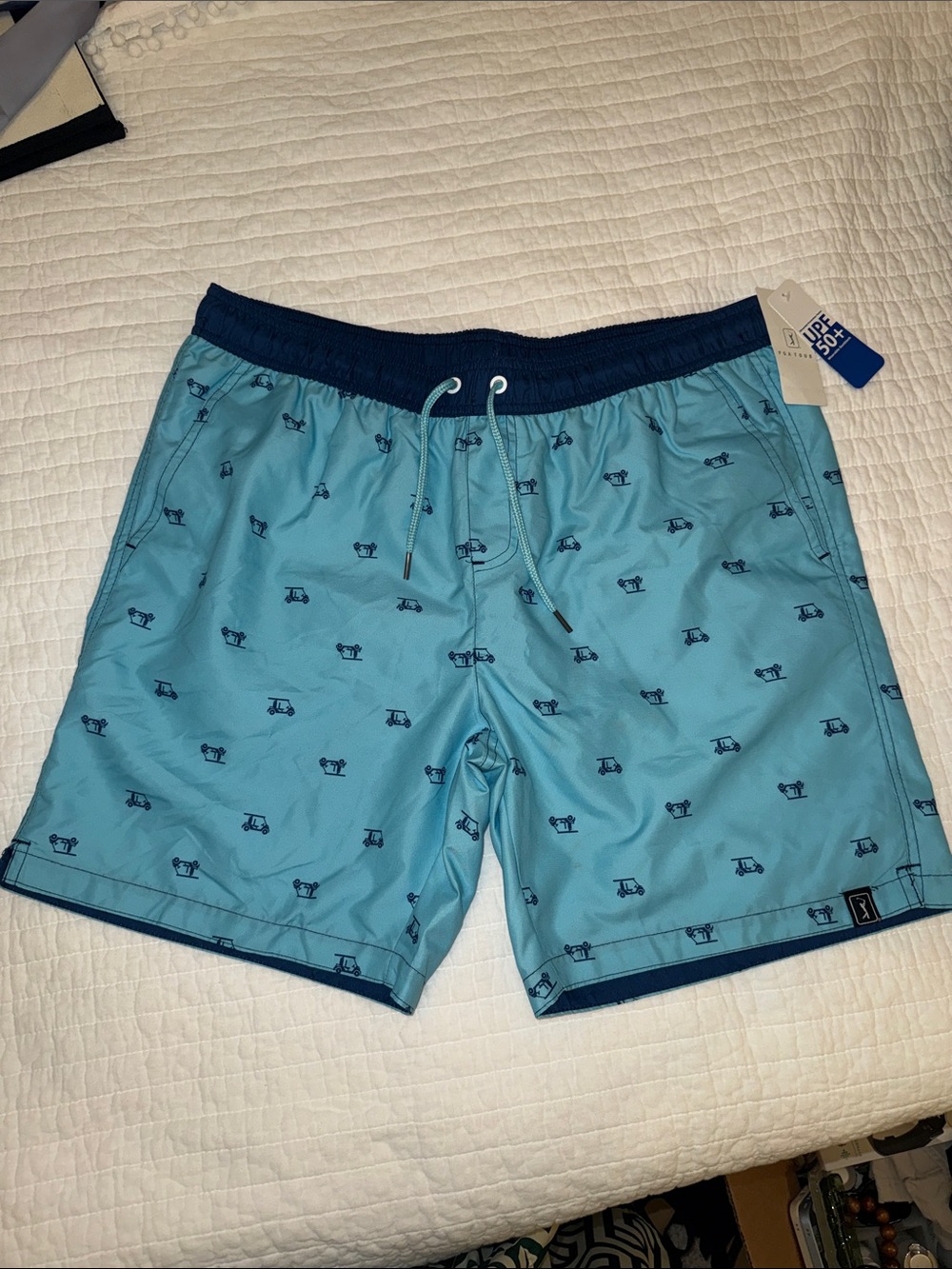 NWT PGA Tour Light Blue Swim Trunks with Navy Waistband and Golf Cart Print